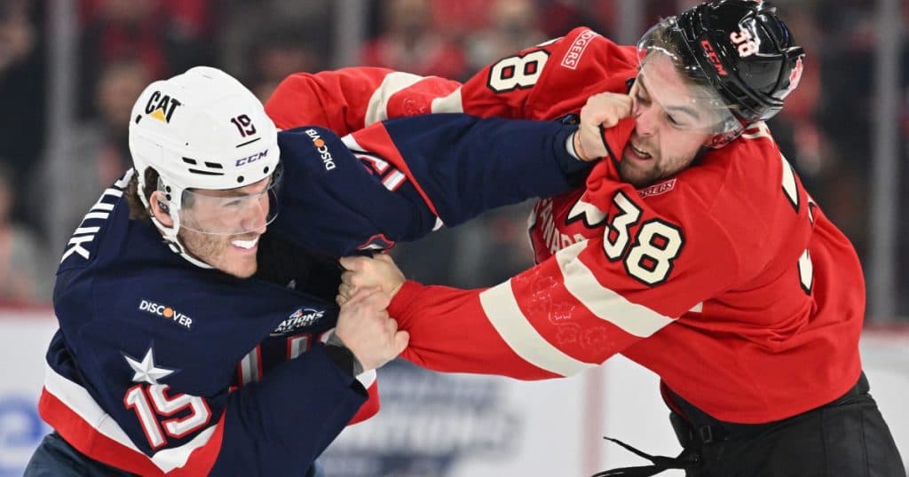 Tensiune maximă la partida de hochei dintre Canada și SUA: Imnul american fluierat, haos și trei altercații în primele nouă secunde.